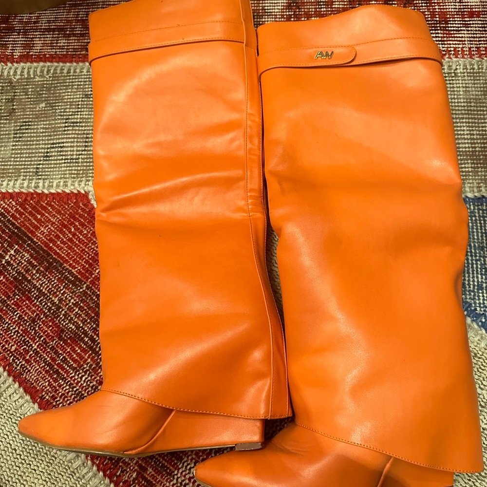 Knee high orange boots in size 8 - Azalea Wang